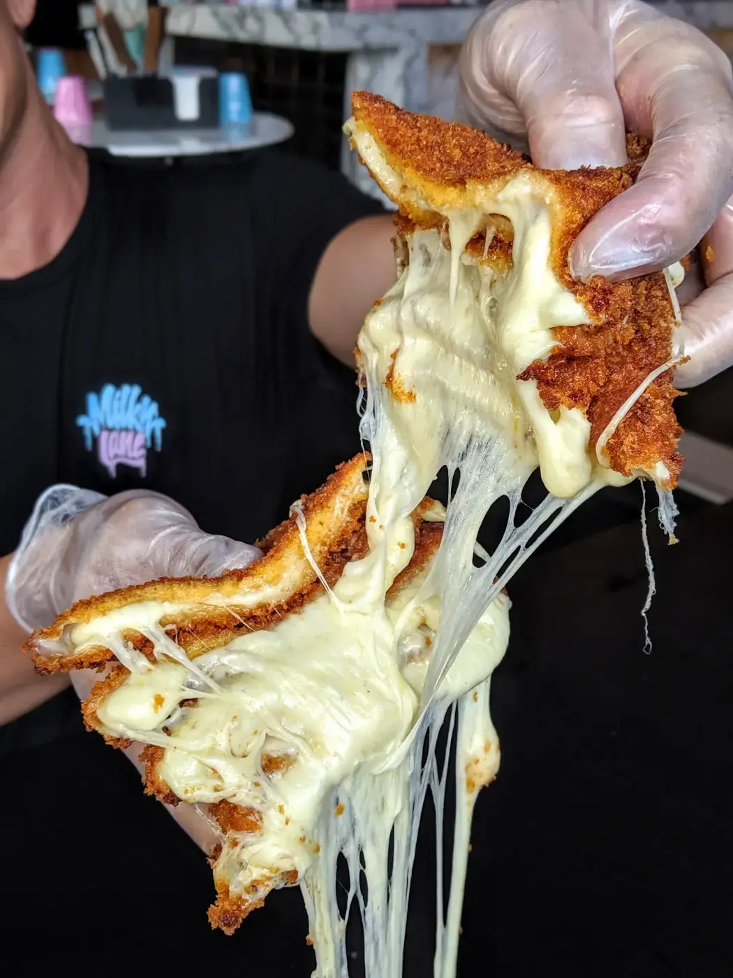 Mozzarella toastie pulled apart, Milky Lane kitchen
