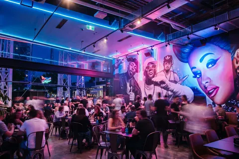 The mural wall and main floor at Milky Lane Newstead