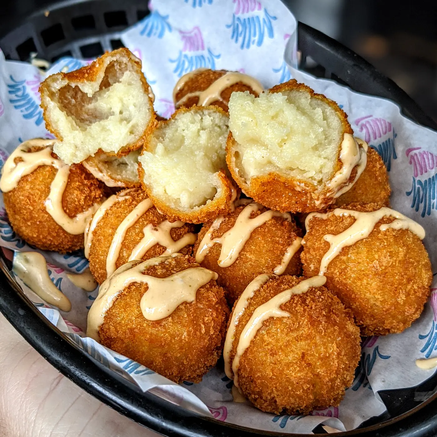 Milky Lane mozzarella balls · crispy panko starters with signature sauce